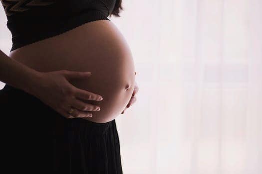 pregnant woman standing