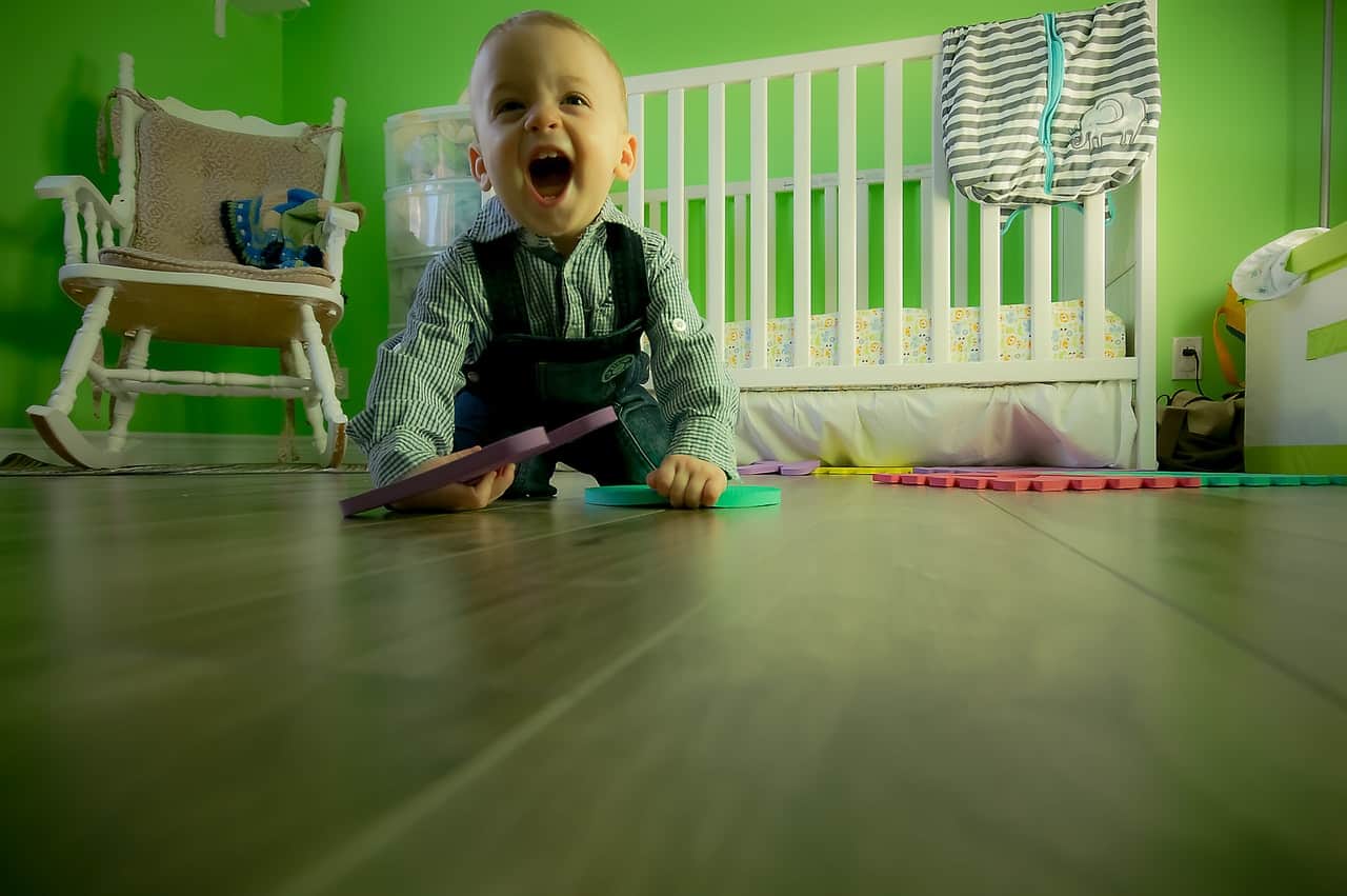 baby playing inside room