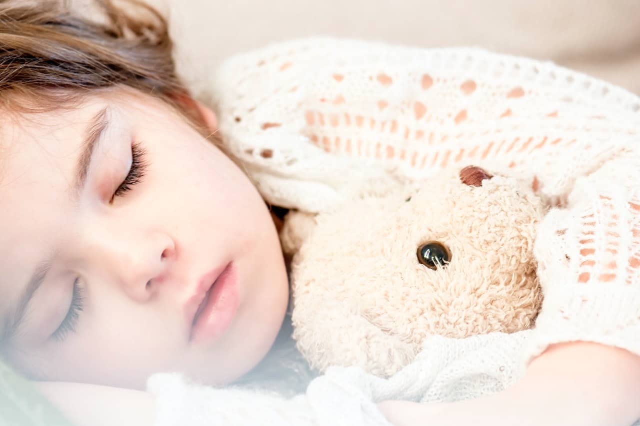 napping baby stuffed toy