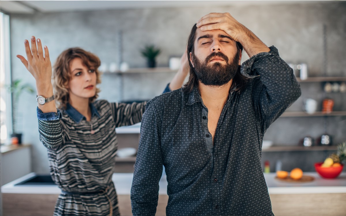 man and a woman fighting