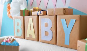 Do You Bring a Gift To a Gender Reveal Party? What to Know