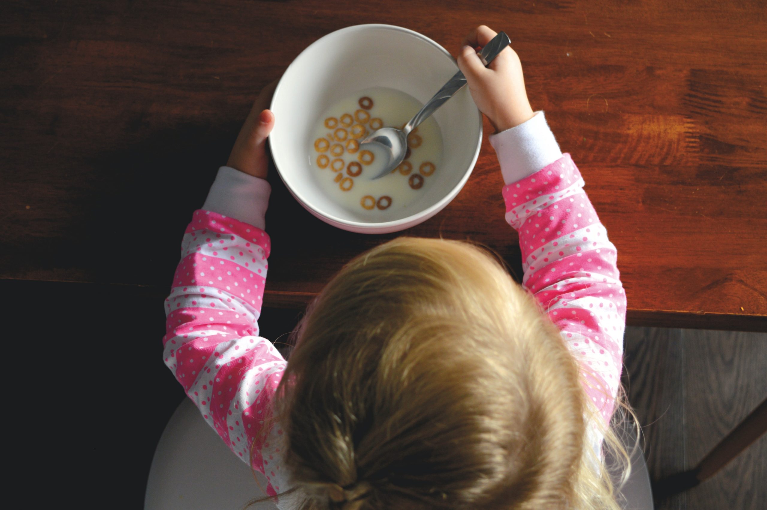 baby eating cereal