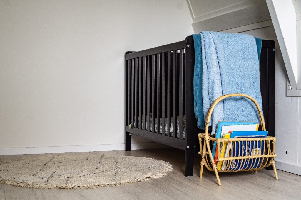 When to Lower Crib Age, Height, & Other Considerations