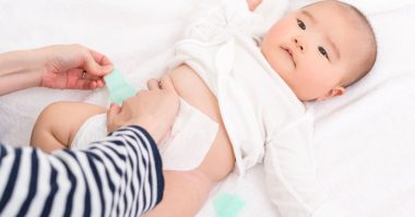 baby getting her diaper changed