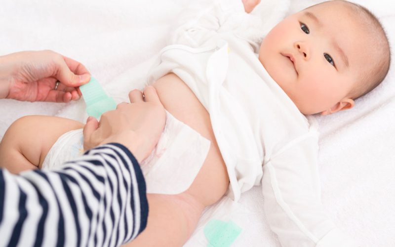 baby getting her diaper changed
