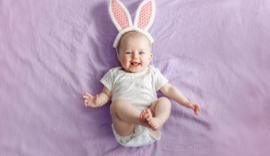 cute baby wearing onesies and bunny headband