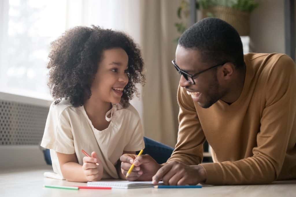 dad coloring with his child