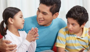 dad talking to his children