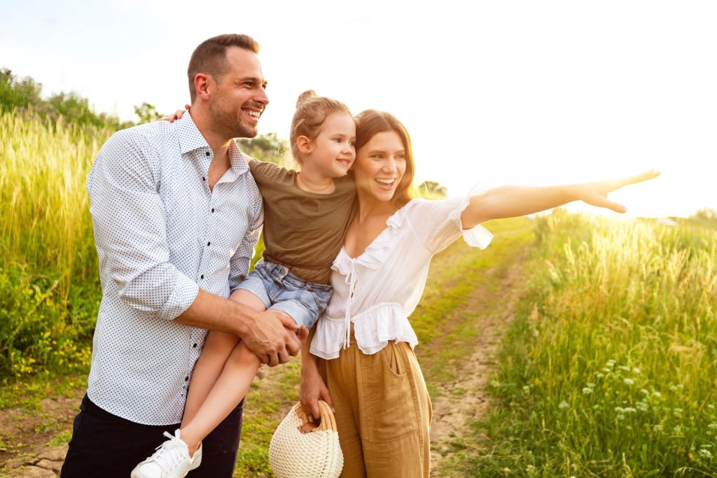 happy family watching the sunset