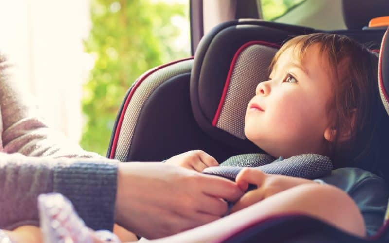 baby looking at mom while in the car seat
