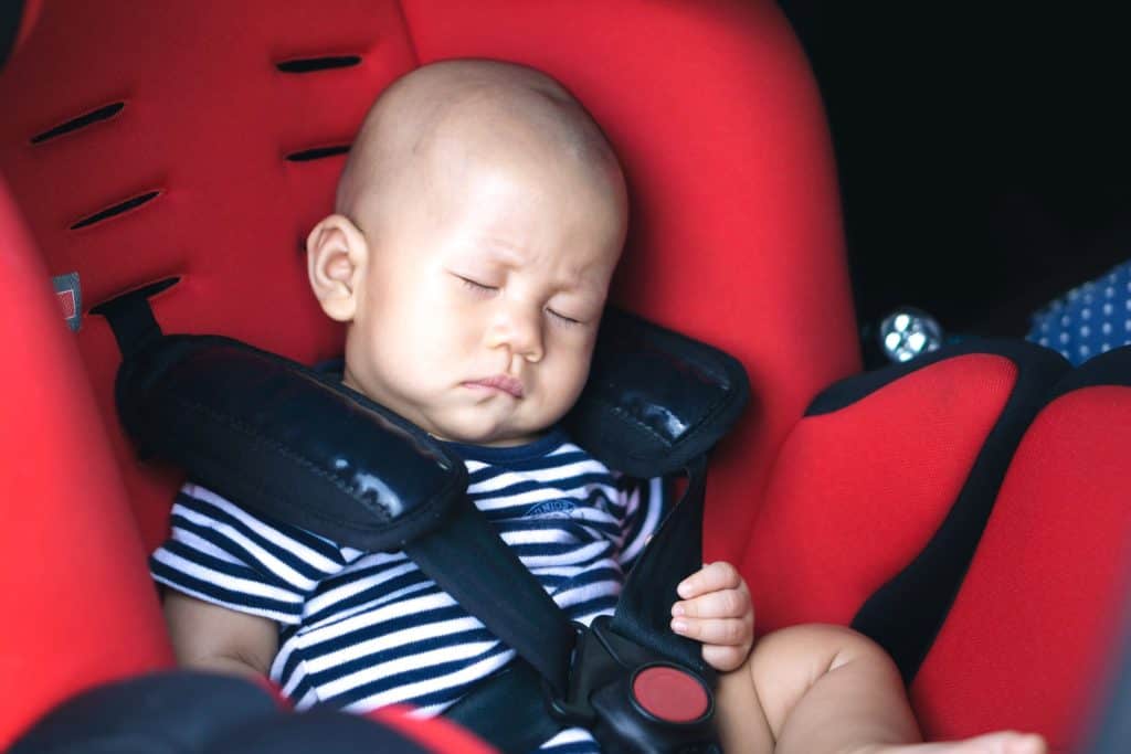 baby sleeping in the car seat