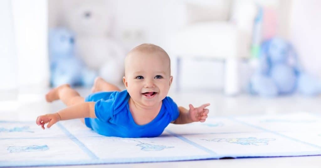 cute baby on a play mat