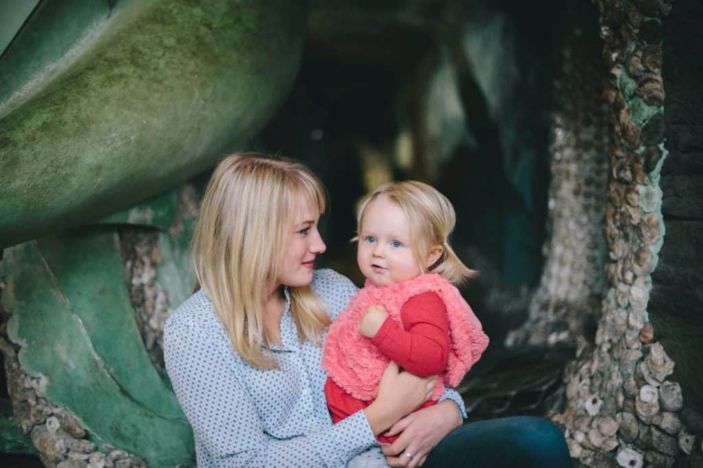 mother holding her little girl