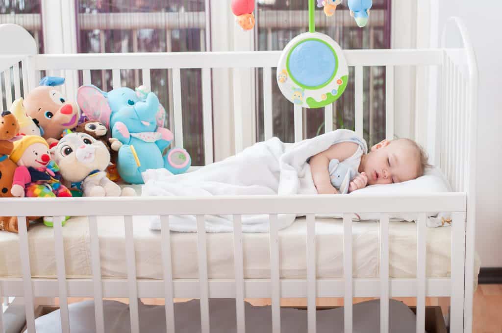 sleeping baby in a crib