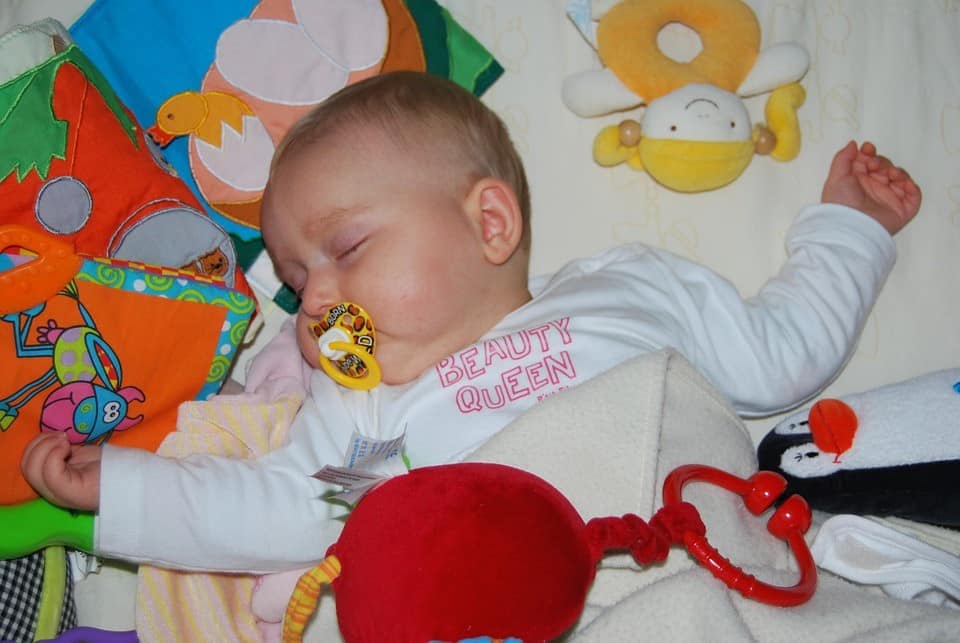 sleeping baby with pacifier