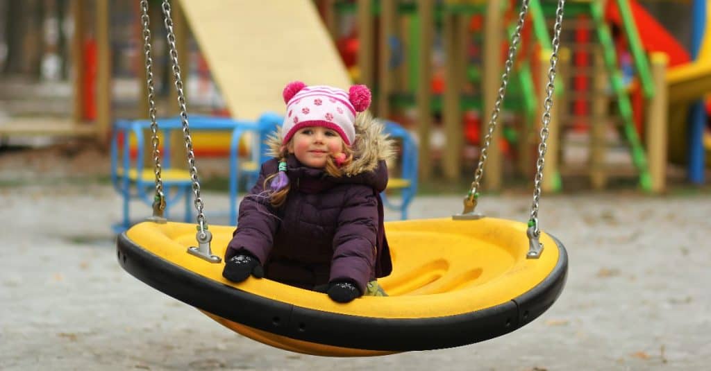 toddler on a swing