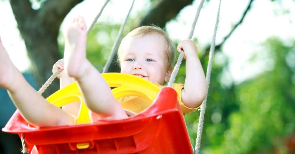 baby boy on a swing