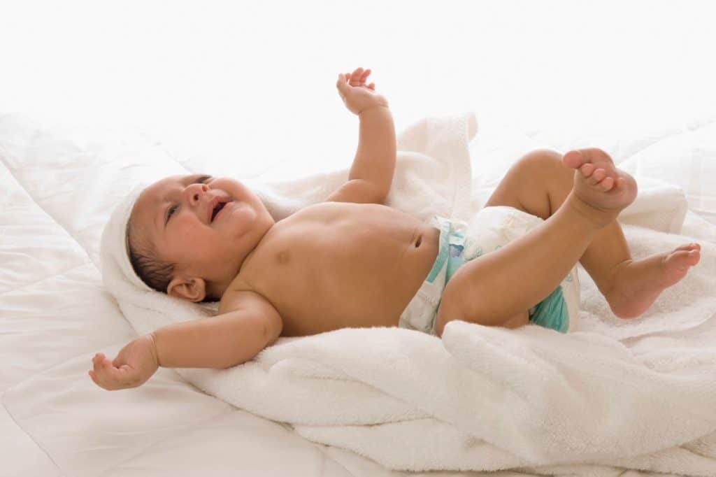 baby on a white towel