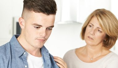 worried mom trying to talk to son
