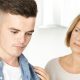 worried mom trying to talk to son