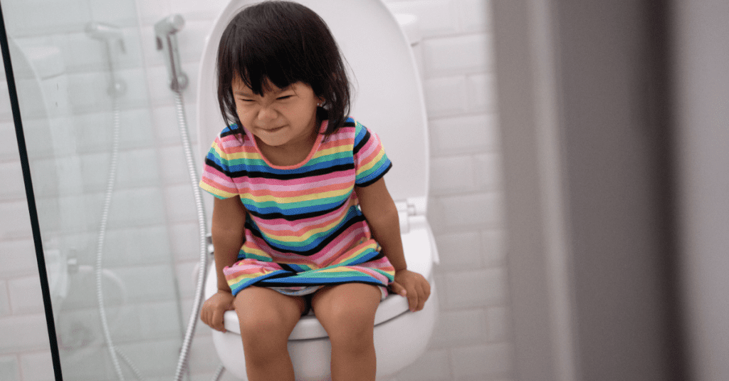 cute toddler pooping