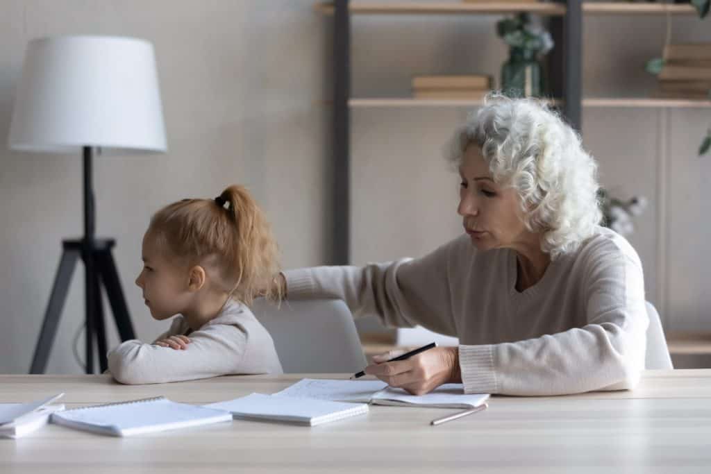 little girl ignoring her grandma