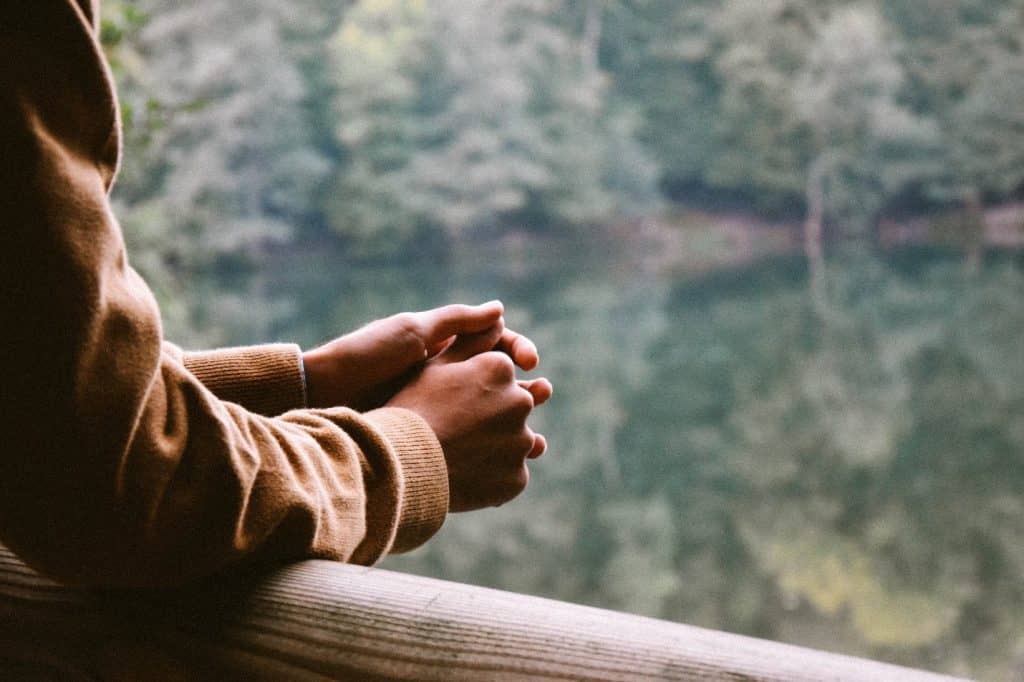 man reflecting in nature