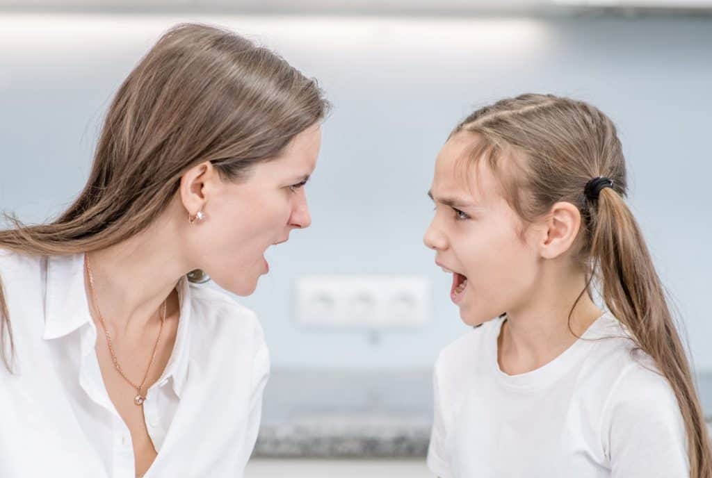 mother and daughter screaming at each other