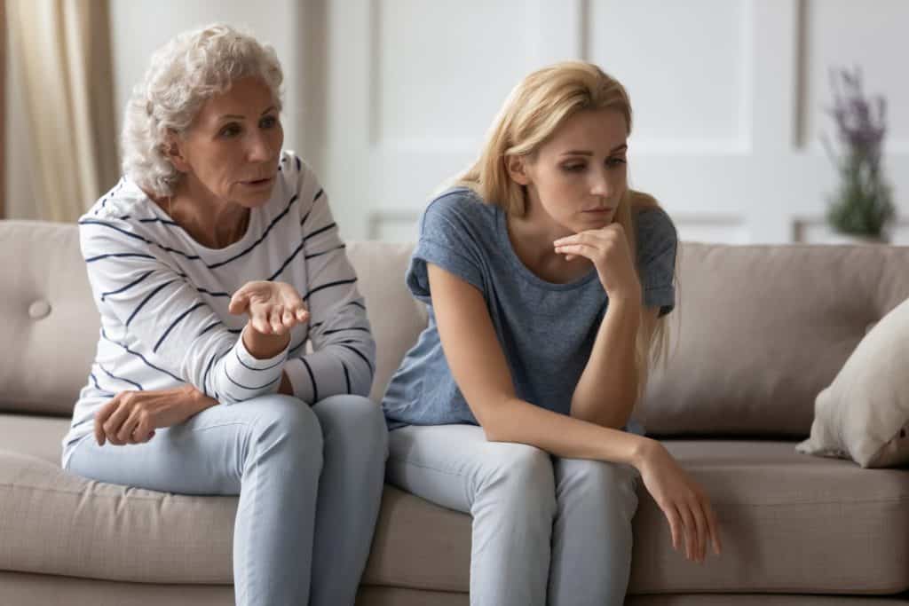 mother explaining something to her daughter