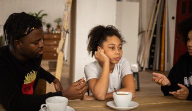 parents speaking to daughter