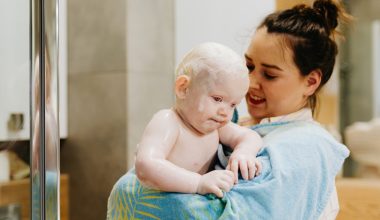woman carrying baby