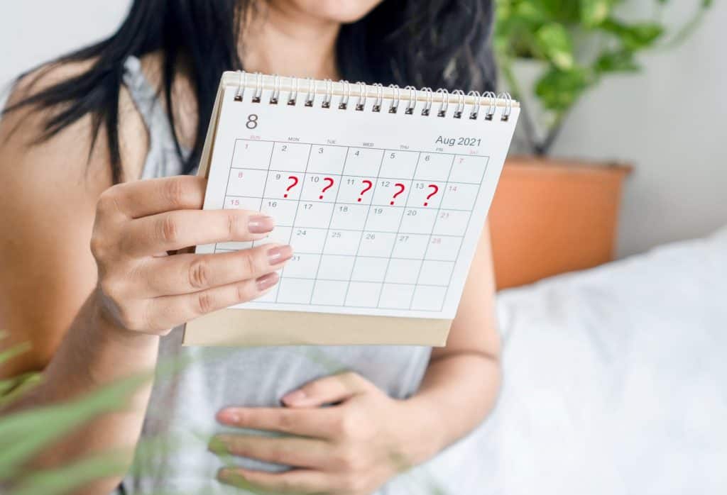 woman holding a calendar