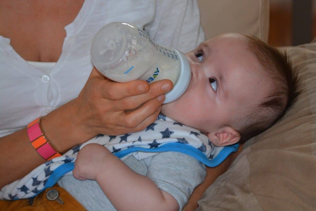 baby drinking milk bottle