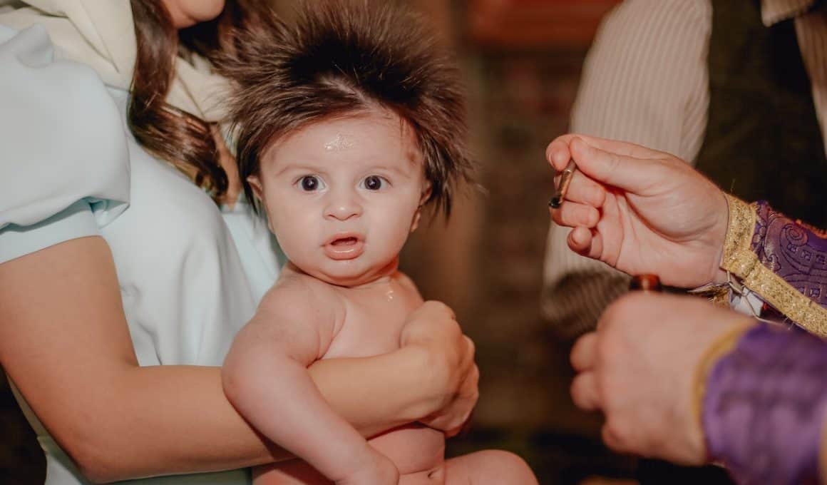 baby during a religious ceremony