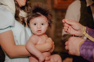 baby during a religious ceremony