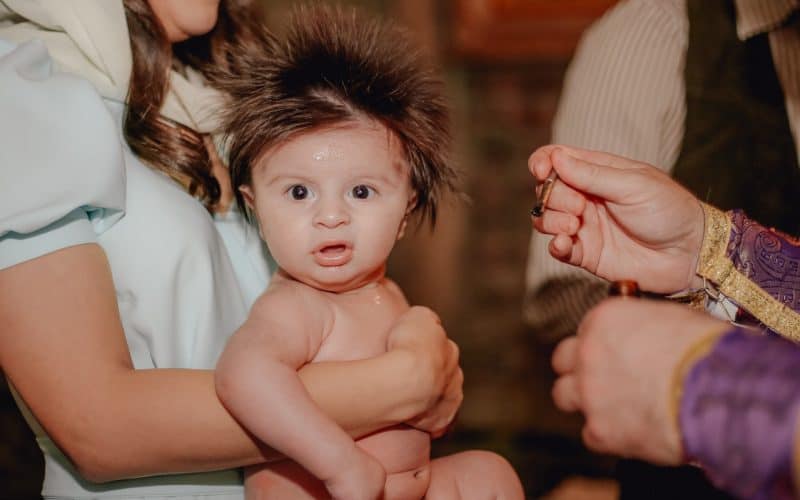 baby during a religious ceremony