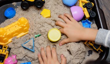 child playing with kinetic sand