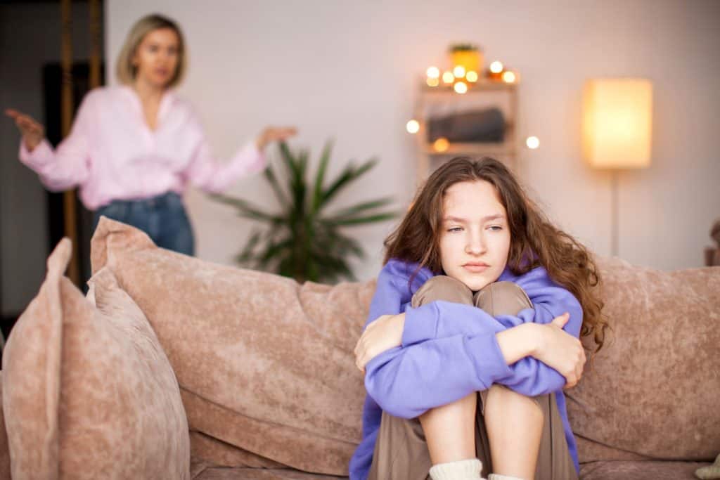 girl ignoring mother