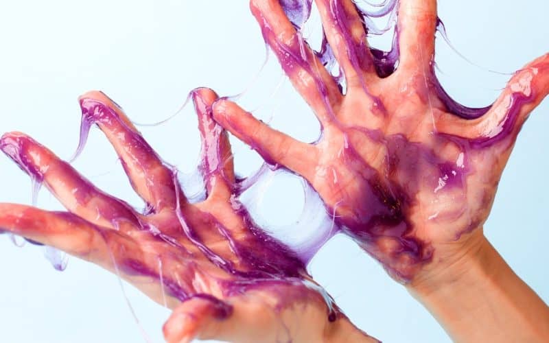 girl with glue on hands