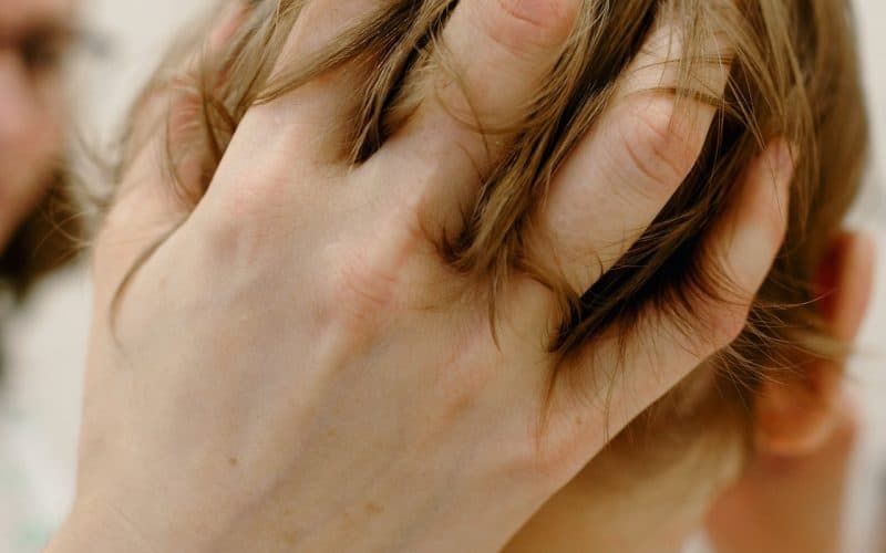 massaging baby's head