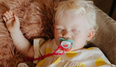 toddler sleeping on sofa