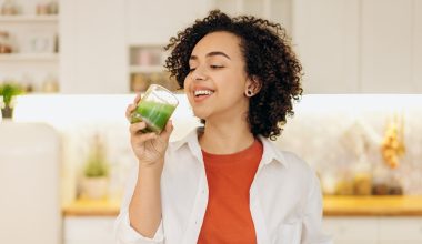 woman drinking smoothie