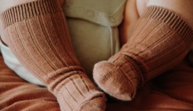 baby with brown socks
