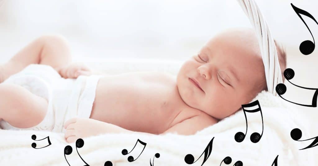 cute baby sleeping on a basket