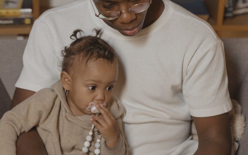 dad reading with baby