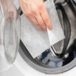 dropping dryer sheet on dryer