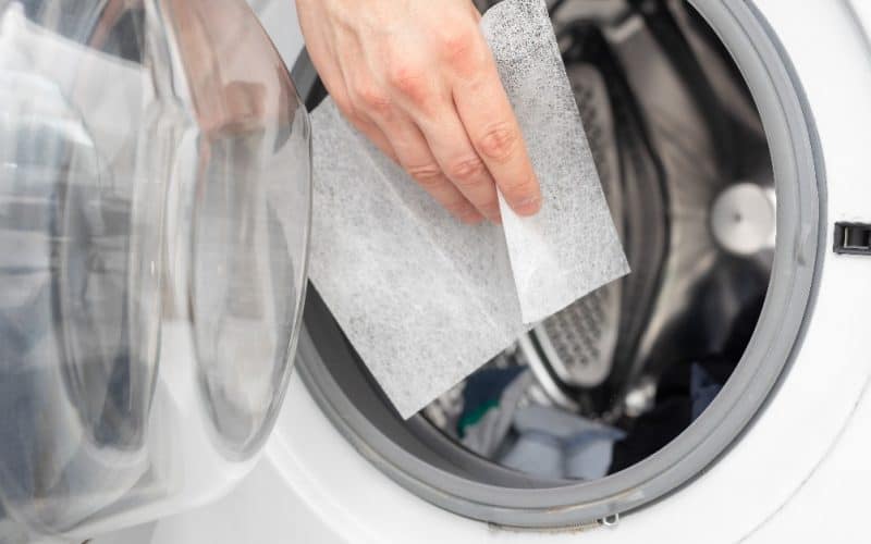 dropping dryer sheet on dryer