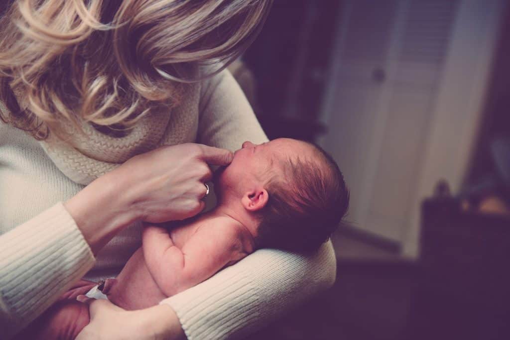 mom soothing crying baby