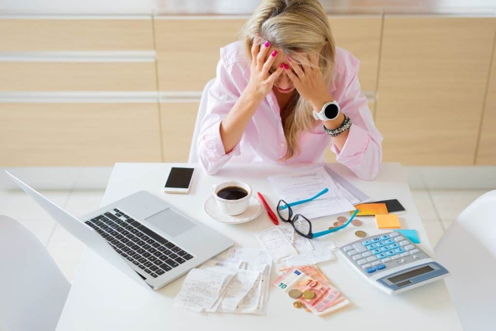stressed out woman because of finances