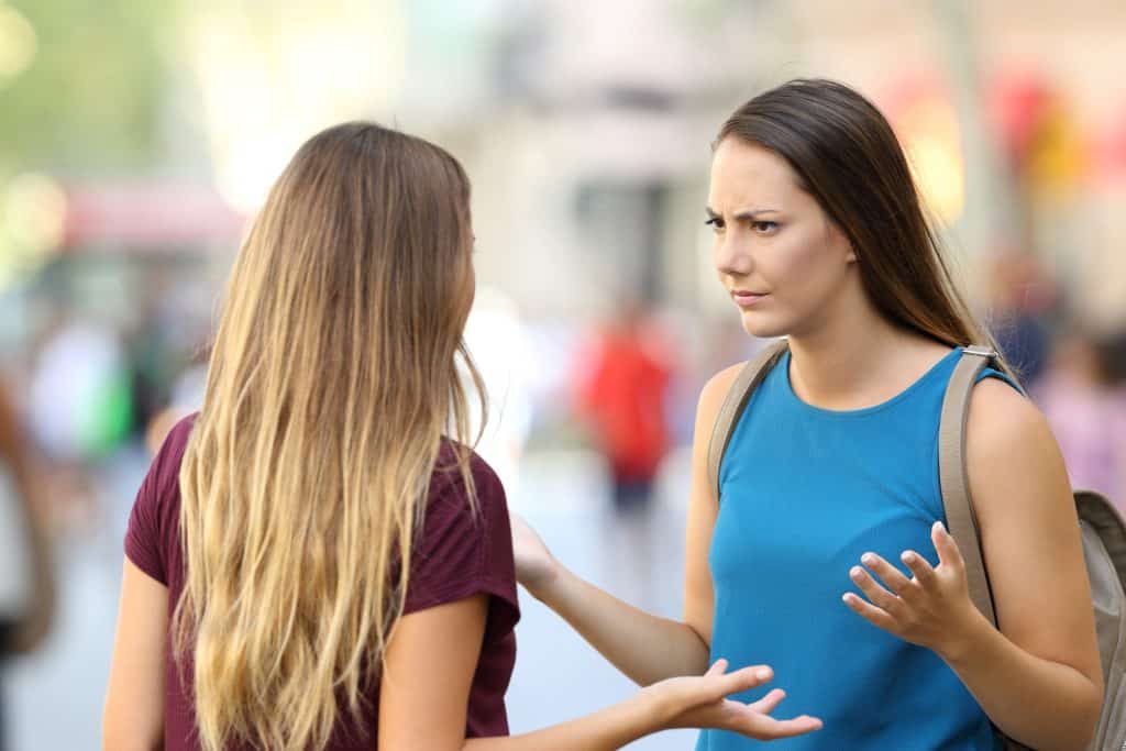 two woman arguing